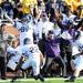 Northwestern coaches and players celebrate after cornerback Demetrius Dugar intercepted a ball thrown by Michigan quarterback Devin Gardner in the fourth quarter at Michigan Stadium on Saturday. Melanie Maxwell I AnnArbor.com